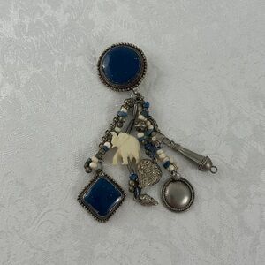 Vintage Artisan Crafted Blue and Silver Charm Brooch with Elephant
